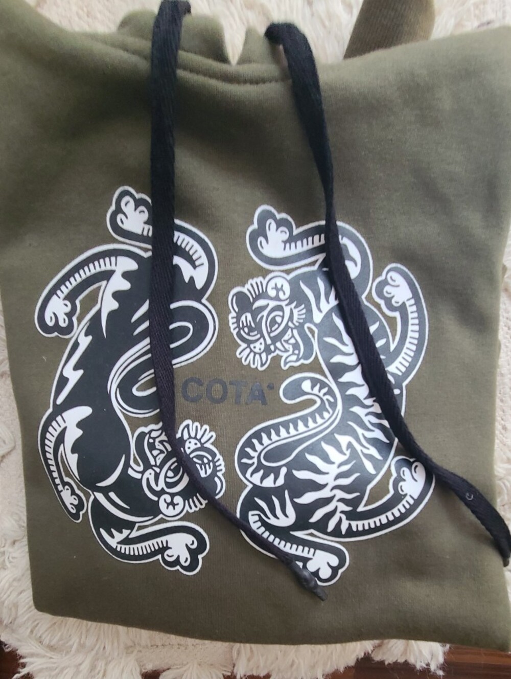 Olive Green Graphic Hoodie with Bold Black & White Tiger Print